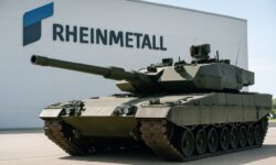 Ein moderner Kampfpanzer steht vor dem Rheinmetall-Werksgebäude bei sonnigem Wetter. Die Aufnahme symbolisiert die Rüstungsindustrie. (Symbolbild – exemplarisch)